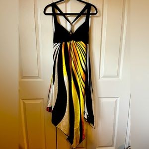 Gold, black and white dress.